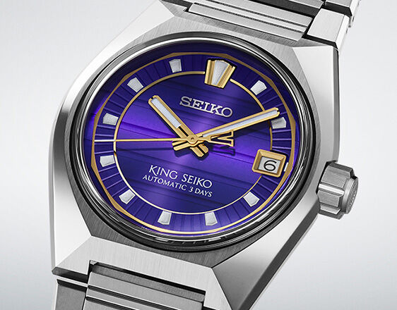 King Seiko automatic watch with vibrant purple dial, gold accents and stainless steel bracelet